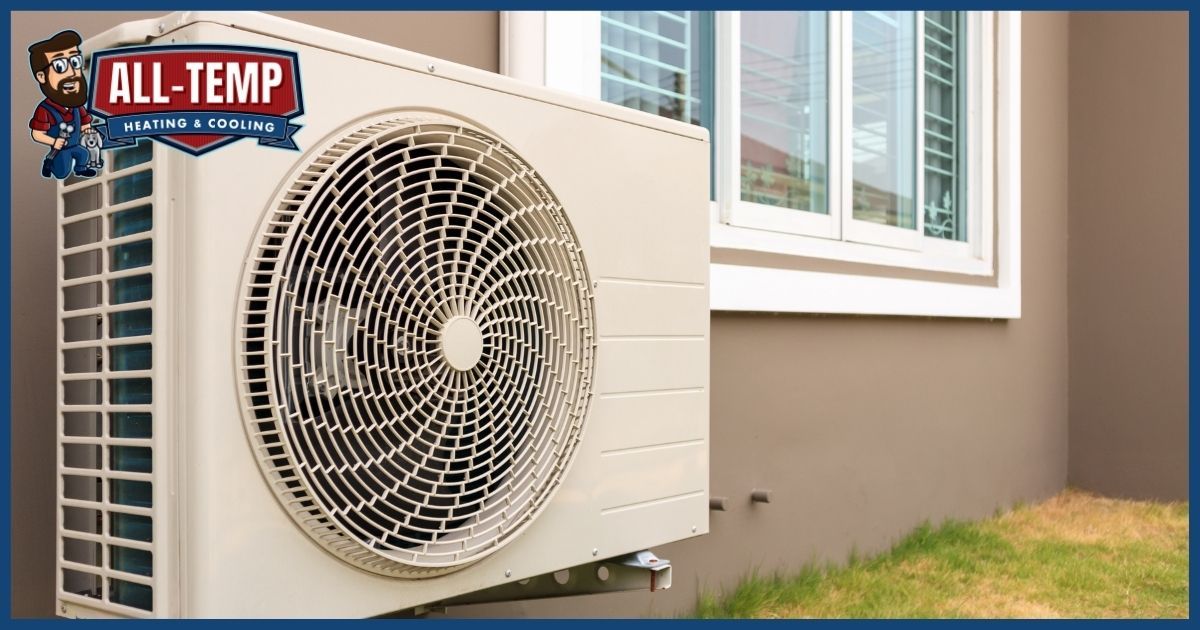 Outdoor AC unit next to house wall