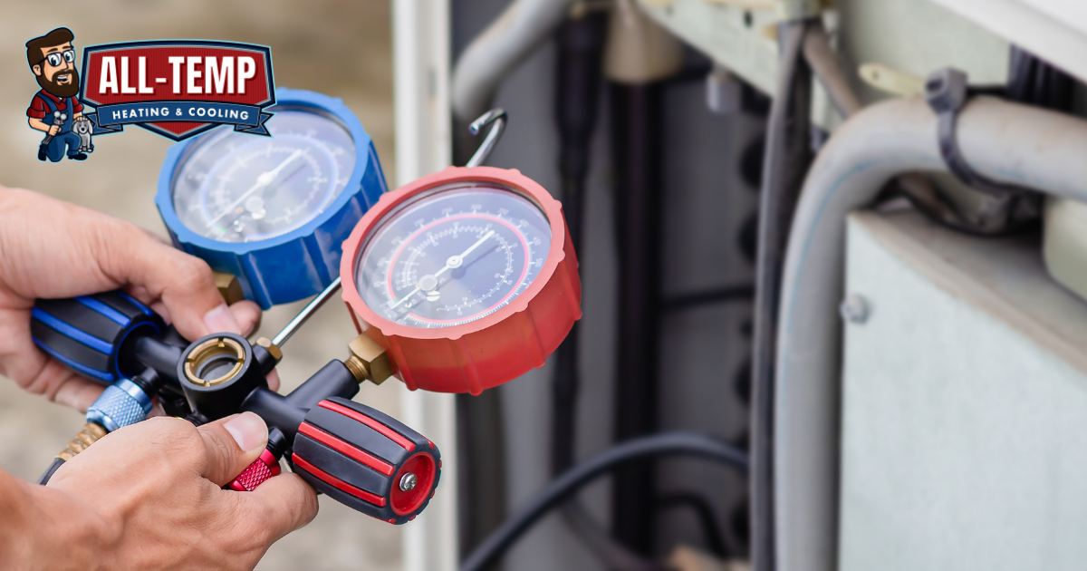 HVAC technician checking AC pressure gauges