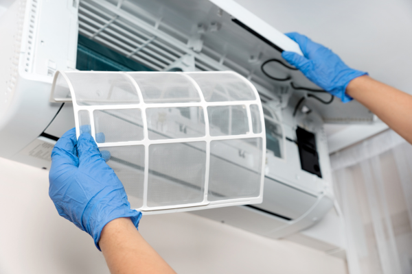 Cleaning AC filter with gloves