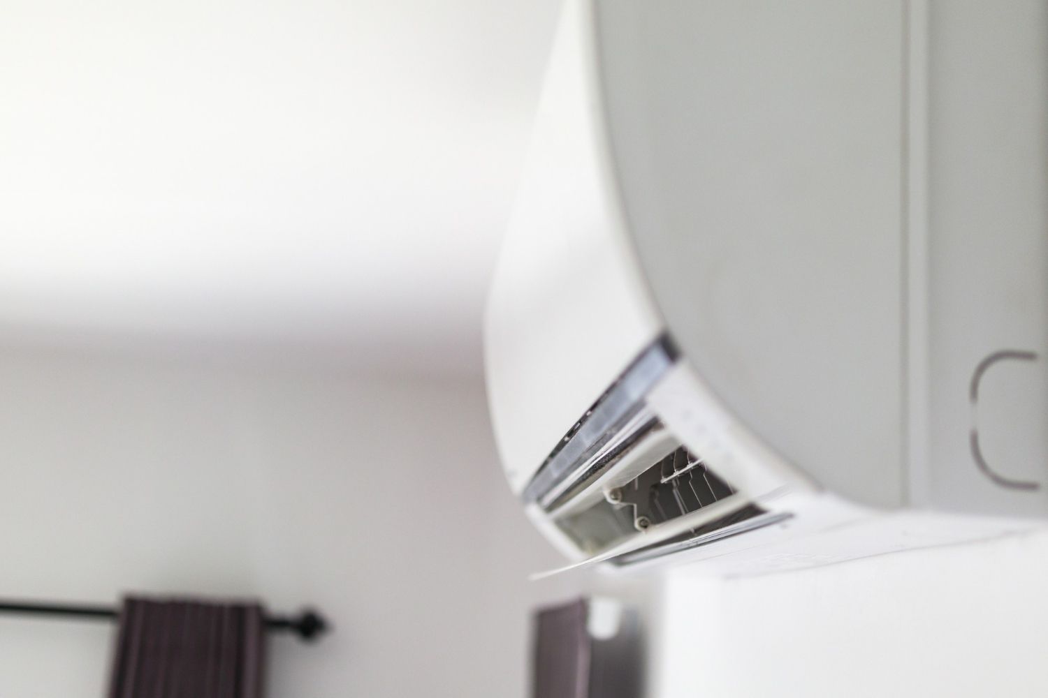Closeup of wall mounted AC unit